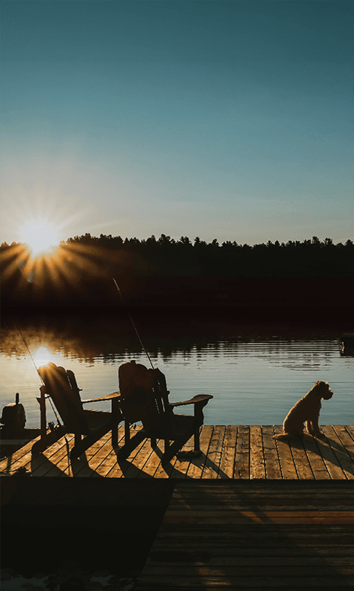 man standing by lake